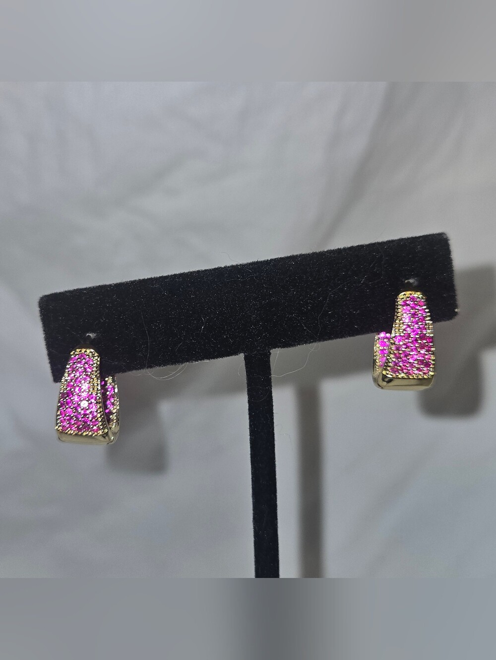 Gold-Tone Huggie Earrings with Bright Pink Pavé Stones